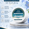 Aneesh Nila Sugar Scrub packaging with floral elements on a blue background